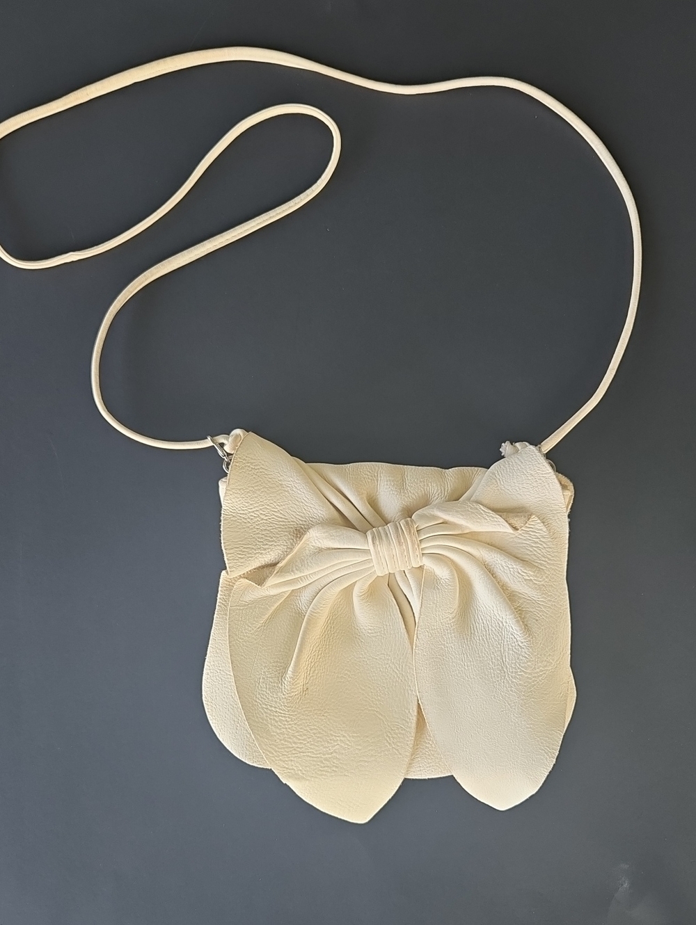 SUSAN FARBER Collections Cream Bow Crossbody